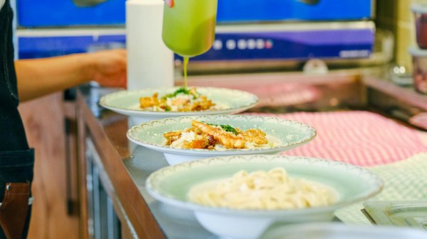 How can community initiatives enhance health and wellness in the UK?